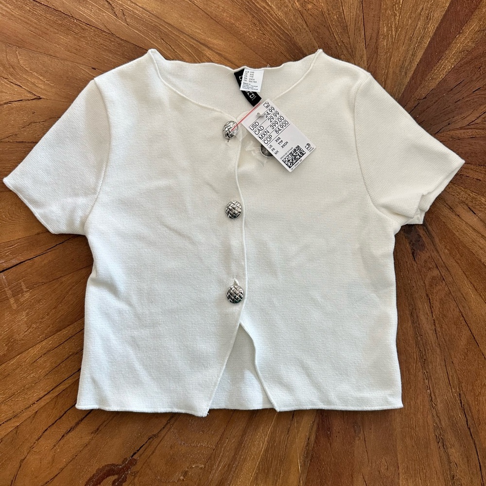 H&M woman’s top. NWT xxs